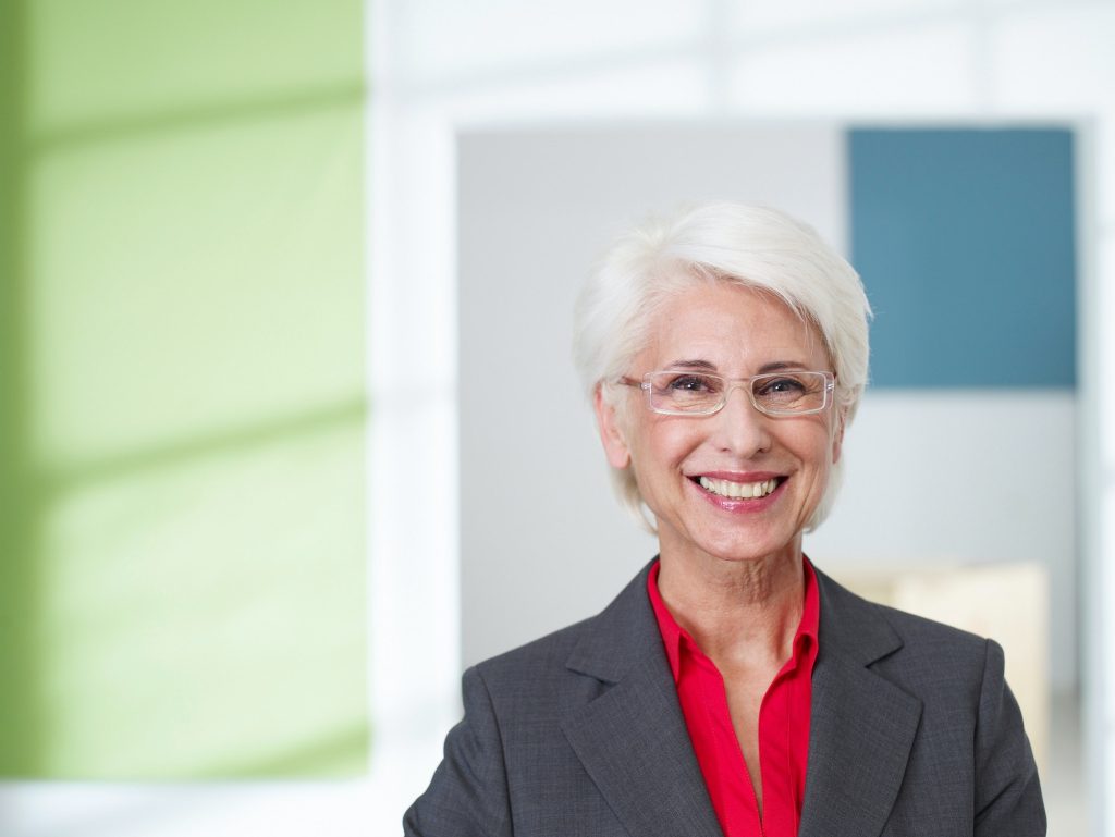 Senior business women in loft